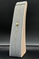 اسوارة قلب مع مستطيلات ذهب صافي عيار 18 وزن 0.9 جر...