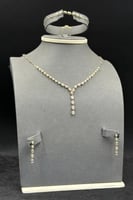 طقم ذهب مع باقيت تصميم الماس عيار 18 وزن 8 جرام