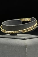 اسوارة مع خاتم ذهب صافي عيار 18 وزن من 6.64 الى 6....