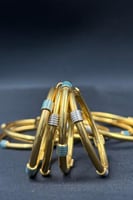 بناجر اطفال ذهب صافي عيار 21