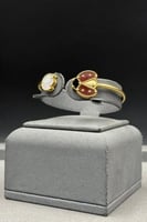 اسوارة خنفساء ذهب مع صدف ملون عيار 18 وزن 8.9 جرام