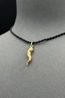 تعليقة ذهب صافي عيار 18 وزن من 1.1 الى 1.2 جرام