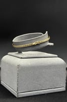 اسوارة ذهب صافي عيار 18 وزن من 1.7 الى 1.8 جرام