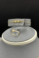 طقم ذهب صافي عيار 21 وزن 5.6 جرام