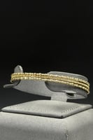 اسوارة مع خاتم ذهب صافي عيار 18 وزن من 6.3 الى 6.4...