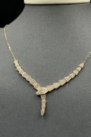 طقم سهم ذهب تصميم الماس عيار 18 وزن 9.9 جرام