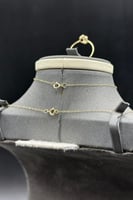 طقم ذهب عيار 18 عقدة الرمز وزن 2.6 جرام