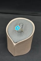 خاتم ورد ذهب مع صدف فيروزي عيار 18 وزن من 1 الى 1....