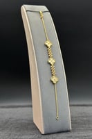 اسوارة ثلاث وردات ذهب صافي عيار 21 وزن من 5.5 الى...