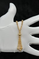 شال نص مجدول ذهب صافي عيار 21 وزن 7.85 جرام