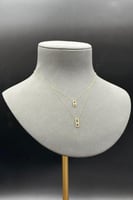 عقد دورين مستطيل ذهب تصميم الماس عيار 18 وزن من 0....