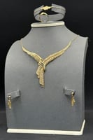 طقم ذهب صافي عيار 21 وزن 11.4 جرام