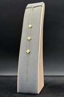 اسوارة ثلاث وردات ذهب صافي عيار 18 وزن 1.8 جرام