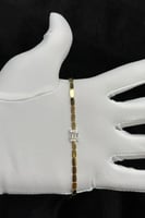 اسوارة ذهب مع باقيت تصميم الماس عيار 18 وزن 5.2 جر...