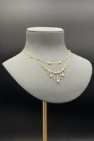 عقد مستطيل دورين ذهب مع لؤلؤ عيار 18 وزن من 4.8 ال...