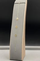 اسوارة وردة ذهب صافي عيار 18 وزن 0.4 جرام