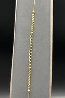 اسوارة جنزير مع كور ذهب صافي عيار 18 وزن 1.3 جرام