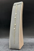 اسوارة شوطين دمعة ذهب مع صدف ابيض عيار 18 وزن 1.5...