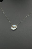 عقد ذهب عيار 18 شكل اكس دائري بتصميم الماس انيق