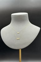 عقد دورين مستطيل ذهب تصميم الماس عيار 18 وزن من 0....