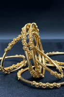 بناجر كور ذهب صافي عيار 21 وزن من 11.4 الى 14.7 جر...