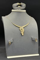 طقم ذهب صافي عيار 21 وزن 7.4 جرام