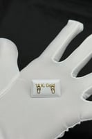 حلق طبي مستطيل ذهب صافي عيار 18