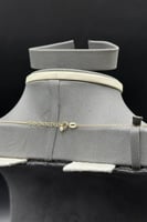 نصف طقم اشناف ذهب مع لؤلؤ عيار 18 وزن 6.7 جرام