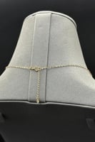 عقد خمسة وردات ذهب صافي عيار 18 وزن من 1.1 الى 1.2...