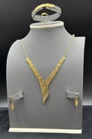 طقم ذهب صافي عيار 21 وزن 12.8 جرام