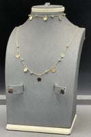 طقم وردات ذهب صافي عيار 18 وزن 5 جرام