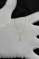 عقد دمعة مفرغ ذهب تصميم الماس عيار 18 وزن 0.3 جرام