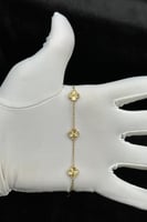 اسوارة ثلاث وردات ذهب صافي عيار 18 وزن 4.3 جرام