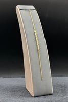 اسوارة ذهب مع لؤلؤ عيار 18 وزن الذهب من 1.16 الى 1...