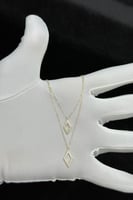 عقد دورين معين ذهب تصميم الماس عيار 18 وزن من 0.8...