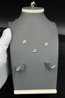 طقم اطفال وردة ذهب تصميم الماس عيار 18 وزن 2.7 جرا...