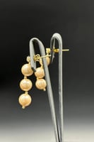 حلق لؤلؤ مع ذهب حلقه عيار 18 وزن 1.1 جرام