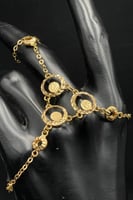 كف أطفال دوائر ذهب صافي عيار 21 وزن 6.9 جرام