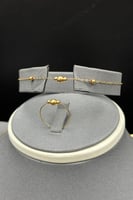 طقم كور ذهب صافي عيار 21 وزن من 3.4 الى 3.5 جرام