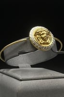 اسوارة مع خاتم ذهب صافي عيار 18 وزن 15.6 جرام