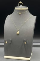 طقم شكل دمعه ذهب تصميم الماس