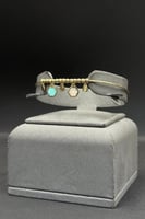 عقد مع اسوارة شكل خلية ذهب ايطالي عيار 18 وزن 15.9...