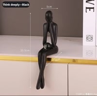 تمثال شخصية مفكر