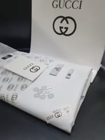 قماش قوتشي 2022 الوان ابيض