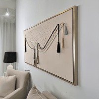 لوحة جدارية تتكون من تفاصيل من الجبس والحبال بتصمي...