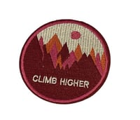 ملصق ملابس climb higher
