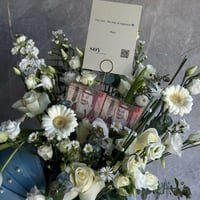 هندول مواليد بتنسيق ورد طبيعي مع مبلغ نقدي 200 ريا...