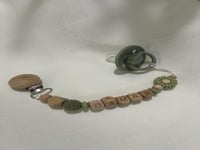 تعليقة لهاية خشبية بالاسم