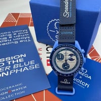 اوميغا سواتش الشهيرة القمر الازرق العملاق