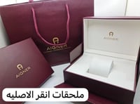 ساعة انقر ذهبي بإطار أسود ماستر كوبي